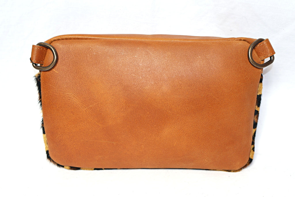 leather shoulder bag, brown leather bag, black leather bag, leather cross body bag, leather bag with two slings, leather shoulder bag, leather bags made in South Africa, animal print moonbag, animal print leather bag, Vesca, brown leather moonbag